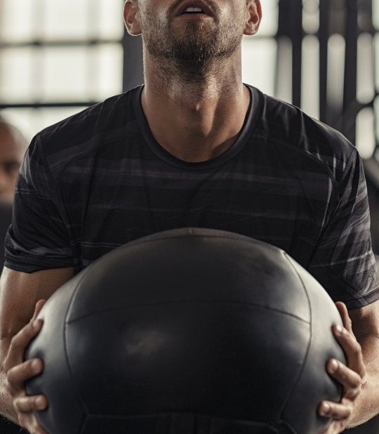 man exercising with a ball