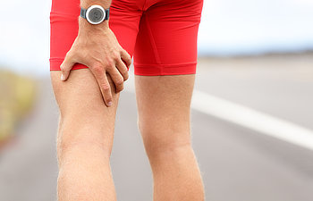 running sports injury with male triathlete runner