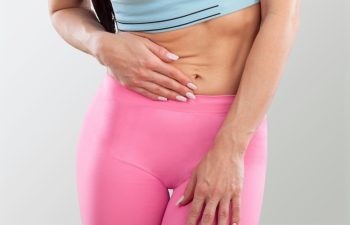 Woman with stomach pain causes of abdominal pain include inflammatory bowel disease. stomach ulcer irritable bowel syndrome, ulcerative colitis and microvilli.